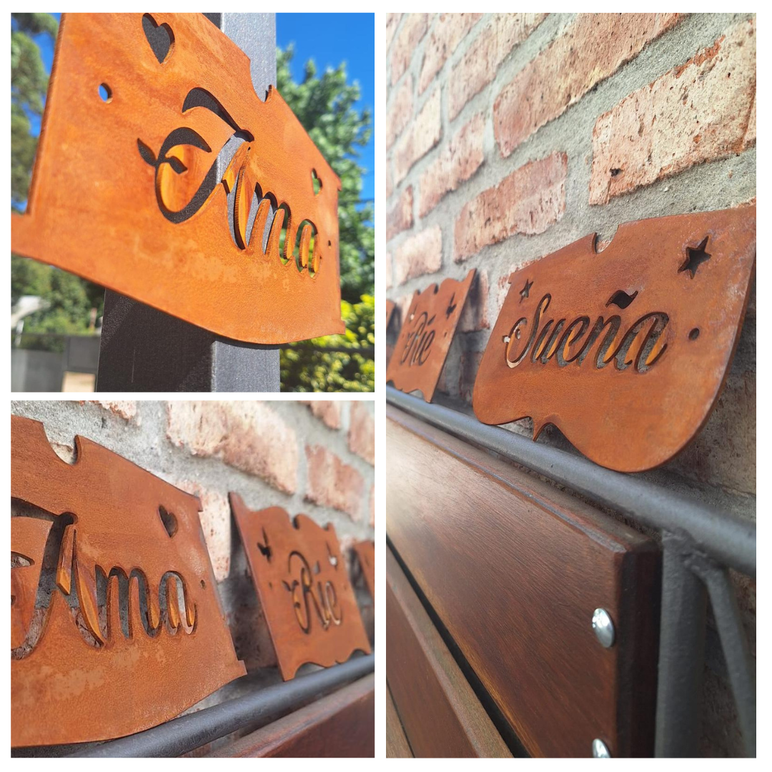 Placas de acero corten oxidadas Ama, Ríe y Sueña